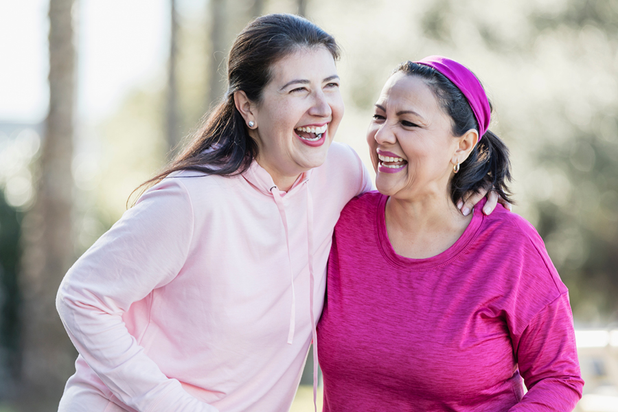 Women in Pink Laughing